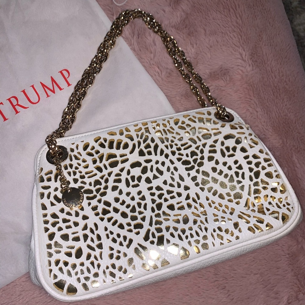 Ivanka Trump white and gold purse